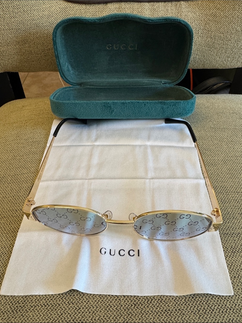 Gucci Gold Frame Sunglasses with Monogram Lenses
